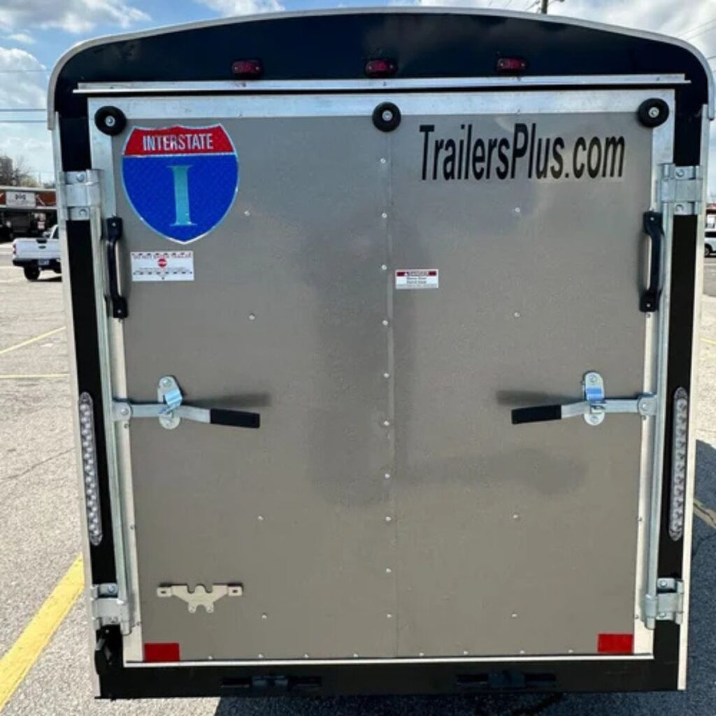 Rear doors of a gray cargo trailer.